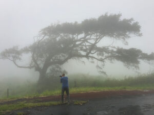 Picture of photography teacher James Godman taking a picture